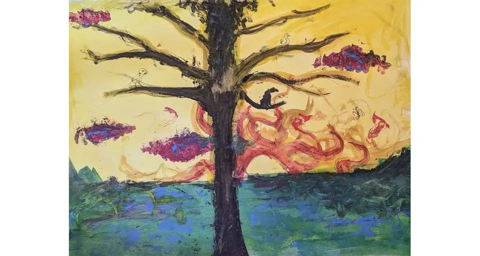 The cedar painted against a yellow sky